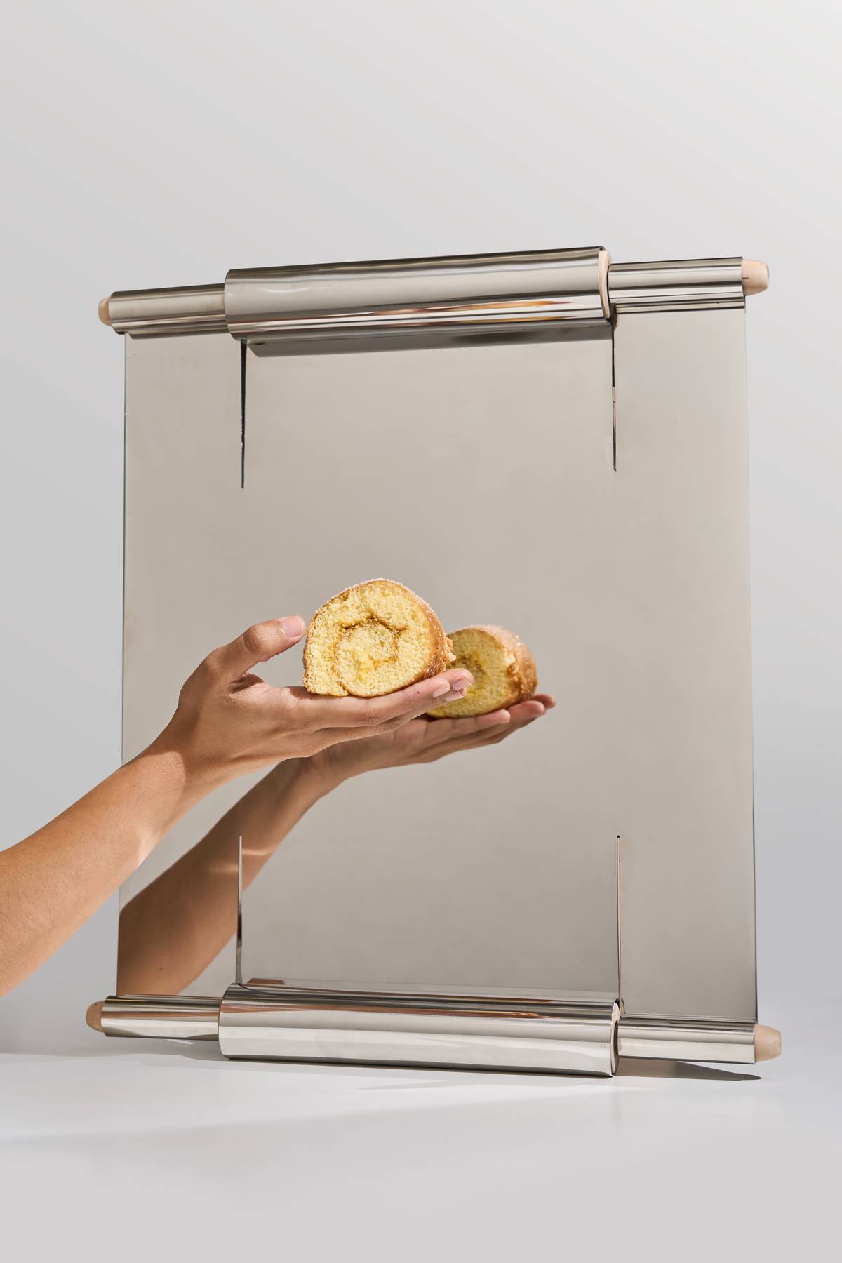 ‘Rolling Reflection,’ a piece reimagining the rolling pin, preserving its inherent sense of movement while redefining its function. Part of the Kamuning Uncommon Goods Collection.