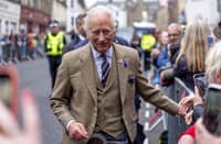 Britain's King Charles III meets members of the public along Main Street in Campbeltown, western Scotland on July 3, 2025, on the third day of their Majesties The King and Queen's visit to Scotland.