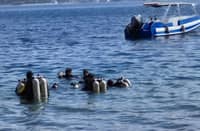 PHILIPPINE Coast Guard divers cut through the stillness of Taal Lake, expecting silt and silence — only to rise with a sack of burned bones,
amid the search for cockfighting aficionados long feared thrown into its depths.