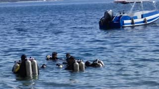 PHILIPPINE Coast Guard divers cut through the stillness of Taal Lake, expecting silt and silence — only to rise with a sack of burned bones,
amid the search for cockfighting aficionados long feared thrown into its depths.