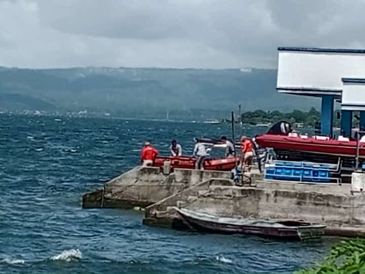 PERSONNEL of the Philippine Coast Guard prepares to scour Taal lake in Talisay, Batangas before the actual dive in search for the 34 sabungeros who were allegedly dumped somewhere in the area.