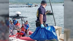 2 cement-filled sacks recovered by divers