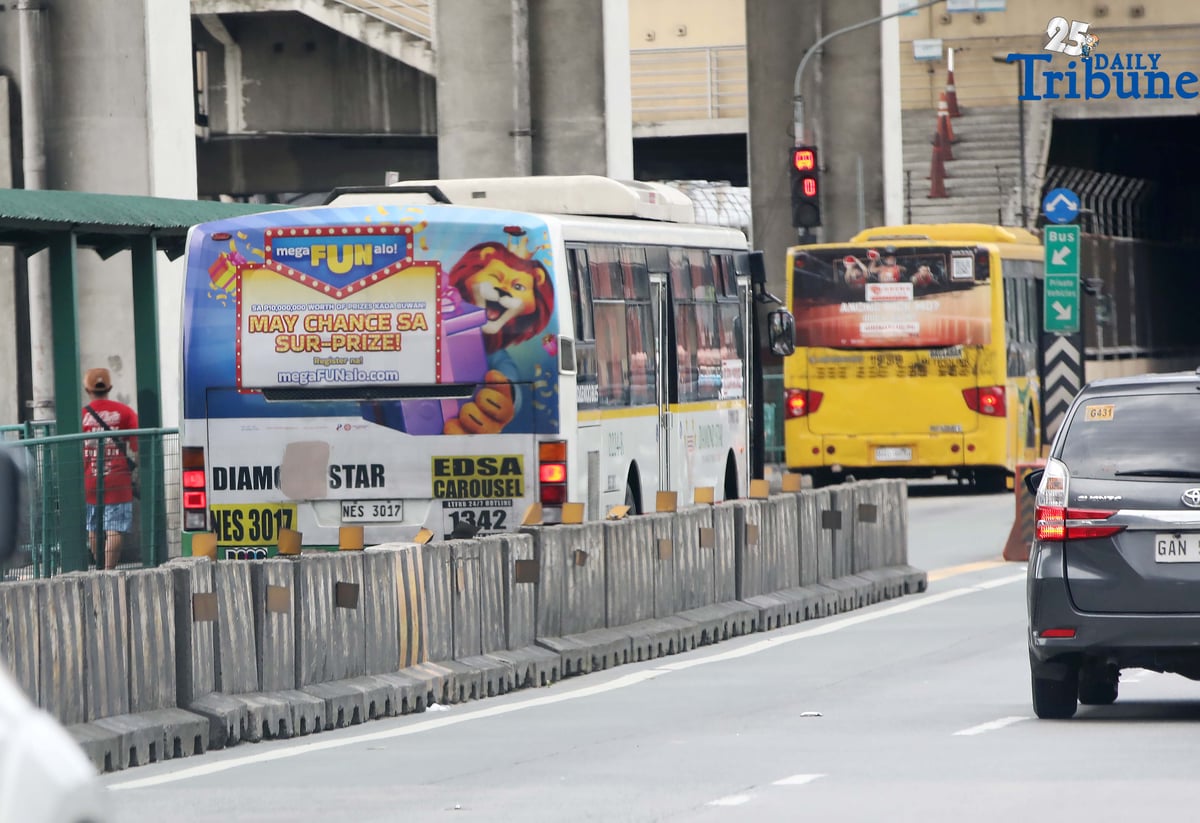 (July, 12 2025) Passengers bus carrying online gambling advertisement ads seen plying Along Edsa on Saturday July 12 2025. The Philippine Amusement and Gaming Corporation (PAGCOR) has ordered the immediate removal of all billboards and other out-of-home gambling advertisements as part of a campaign to crack down on gambling-related advertisements and promotions. In a memorandum issued on July 7, the agency directed all licensees, suppliers, system administrators, and gaming venue operators to remove advertising materials, including those displayed on trains, buses, jeepneys, and taxis. PAGCOR clarified that only institutional or responsible gaming campaigns approved by the agency will be allowed from now on. They gave all licensees and stakeholders until August 15 to completely remove all gambling-related ads," said PAGCOR. Photo/Analy Labor