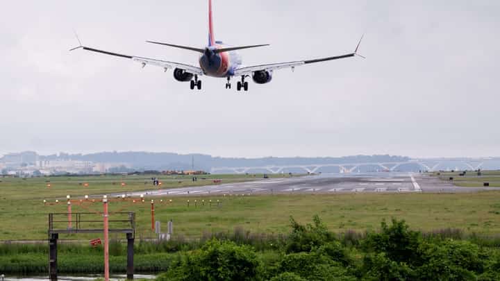 A Southwest Airlines Boeing 737-8 MAX airplane prepares to land at Ronald Reagan Washington National Airport in Arlington, Virginia, on 10 July 2025.