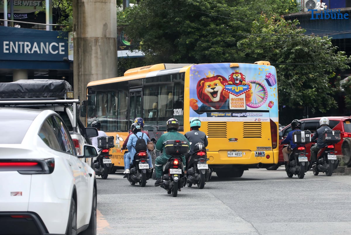 (July, 12 2025) Passengers bus carrying online gambling advertisement ads seen plying Along Edsa on Saturday July 12 2025. The Philippine Amusement and Gaming Corporation (PAGCOR) has ordered the immediate removal of all billboards and other out-of-home gambling advertisements as part of a campaign to crack down on gambling-related advertisements and promotions. In a memorandum issued on July 7, the agency directed all licensees, suppliers, system administrators, and gaming venue operators to remove advertising materials, including those displayed on trains, buses, jeepneys, and taxis. PAGCOR clarified that only institutional or responsible gaming campaigns approved by the agency will be allowed from now on. They gave all licensees and stakeholders until August 15 to completely remove all gambling-related ads," said PAGCOR. Photo/Analy Labor