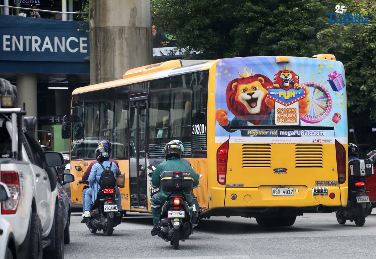 (July, 12 2025) Passengers bus carrying online gambling advertisement ads seen plying Along Edsa on Saturday July 12 2025. The Philippine Amusement and Gaming Corporation (PAGCOR) has ordered the immediate removal of all billboards and other out-of-home gambling advertisements as part of a campaign to crack down on gambling-related advertisements and promotions. In a memorandum issued on July 7, the agency directed all licensees, suppliers, system administrators, and gaming venue operators to remove advertising materials, including those displayed on trains, buses, jeepneys, and taxis. PAGCOR clarified that only institutional or responsible gaming campaigns approved by the agency will be allowed from now on. They gave all licensees and stakeholders until August 15 to completely remove all gambling-related ads," said PAGCOR. Photo/Analy Labor