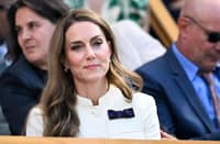 Britain's Catherine, Princess of Wales reacts as she sits in the Royal Box on Centre Court for their women's singles final tennis match between Poland's Iga Swiatek and US player Amanda Anisimova on the thirteenth day of the 2025 Wimbledon Championships at The All England Lawn Tennis and Croquet Club in Wimbledon, southwest London, on July 12, 2025.