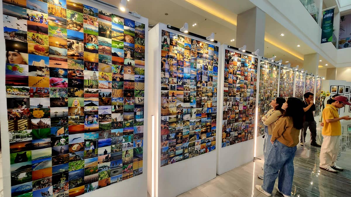 Thousands of photos make up the 'Photo Nation' wall at the exhibit 'Chromatic Realms.'