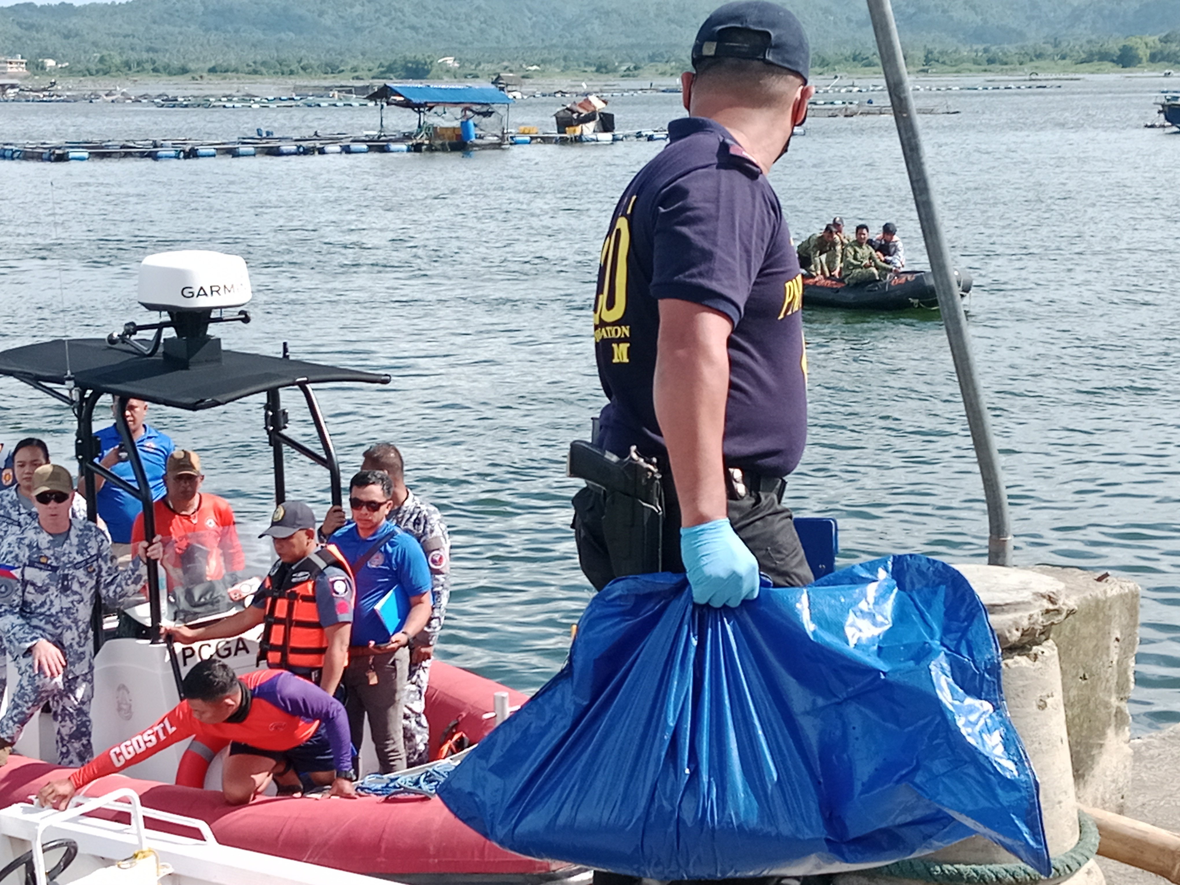 Taal Lake sacks stir false alarm, just fish cage weights, says local