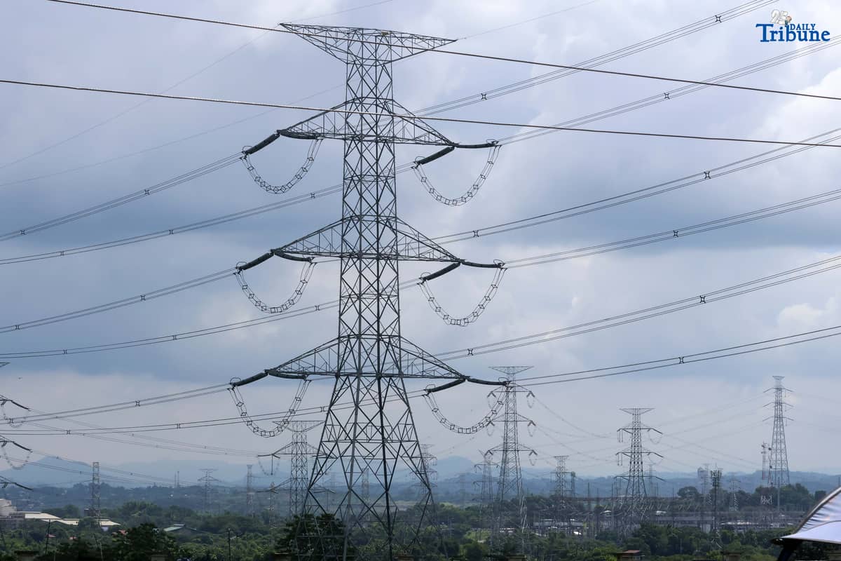 Transmission lines in San Jose del Monte, Bulacan are shown supplying electricity from power plants to substations and end-users on Tuesday. The National Grid Corporation of the Philippines (NGCP) reported that transmission wheeling rates rose slightly in June to ₱0.4611/kWh from ₱0.4593/kWh. NGCP will begin implementing the Energy Regulatory Commission's directive allowing it to recover ₱28.28 billion in under-recoveries from consumers over the next seven years.