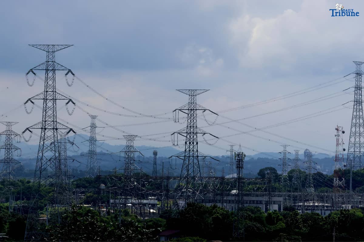 Transmission lines in San Jose del Monte, Bulacan are shown supplying electricity from power plants to substations and end-users on Tuesday. The National Grid Corporation of the Philippines (NGCP) reported that transmission wheeling rates rose slightly in June to ₱0.4611/kWh from ₱0.4593/kWh. NGCP will begin implementing the Energy Regulatory Commission's directive allowing it to recover ₱28.28 billion in under-recoveries from consumers over the next seven years.