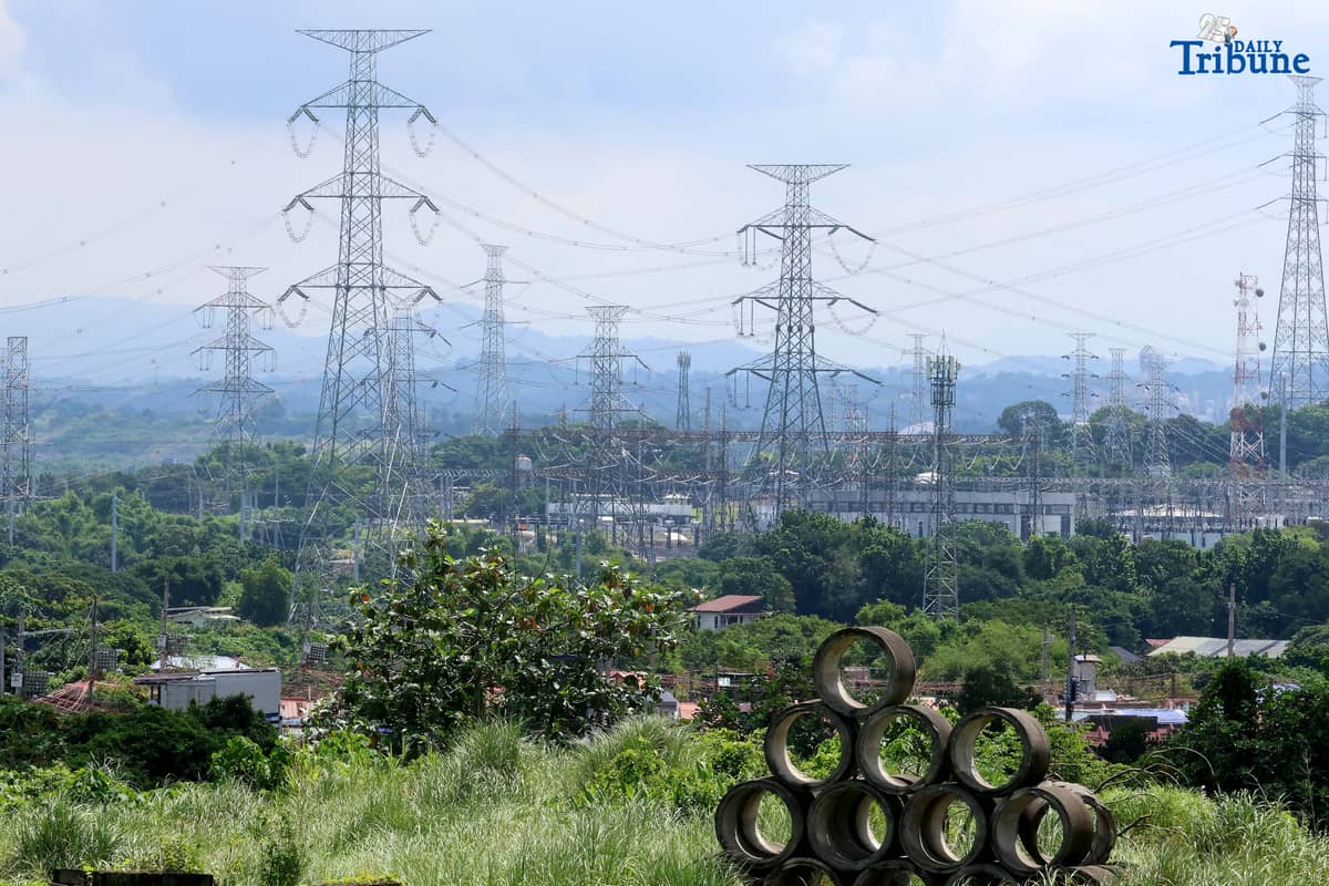Transmission lines in San Jose del Monte, Bulacan are shown supplying electricity from power plants to substations and end-users on Tuesday. The National Grid Corporation of the Philippines (NGCP) reported that transmission wheeling rates rose slightly in June to ₱0.4611/kWh from ₱0.4593/kWh. NGCP will begin implementing the Energy Regulatory Commission's directive allowing it to recover ₱28.28 billion in under-recoveries from consumers over the next seven years.