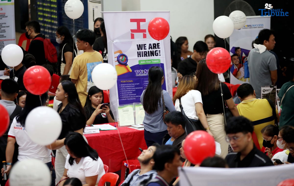 JOB seekers crowd the Mega Job Fair 2025 organized by the San Juan City local government on Thursday. The event aims to connect applicants with employment opportunities.