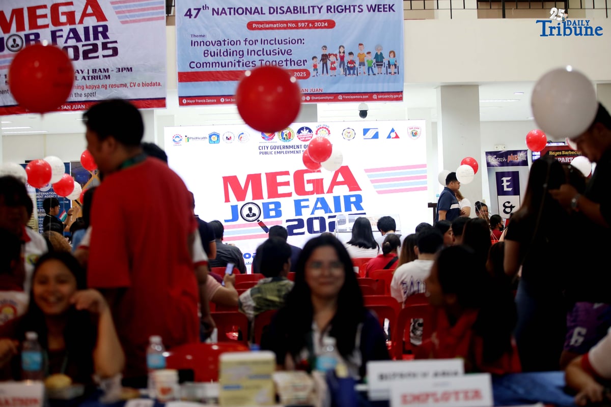 JOB seekers crowd the Mega Job Fair 2025 organized by the San Juan City local government on Thursday. The event aims to connect applicants with employment opportunities.