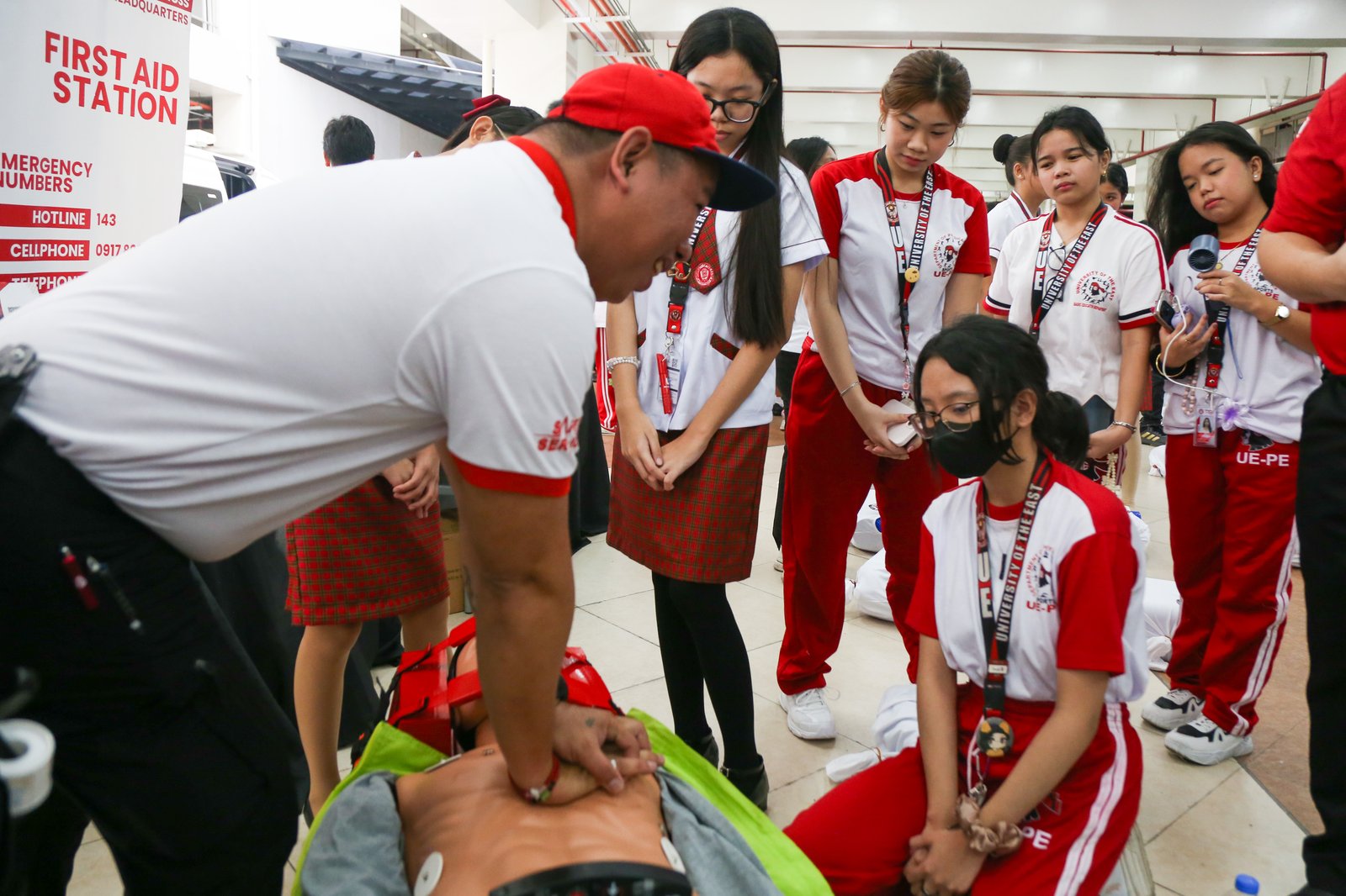 Students from the University East learn how to administer cardiopulmonary resuscitation (CPR) in celebration of National CPR Day (17 July 2025). It also coincides with the anniversary of Republic Act 10871, also known as the Samboy Lim Law, which mandates basic life support training in schools.