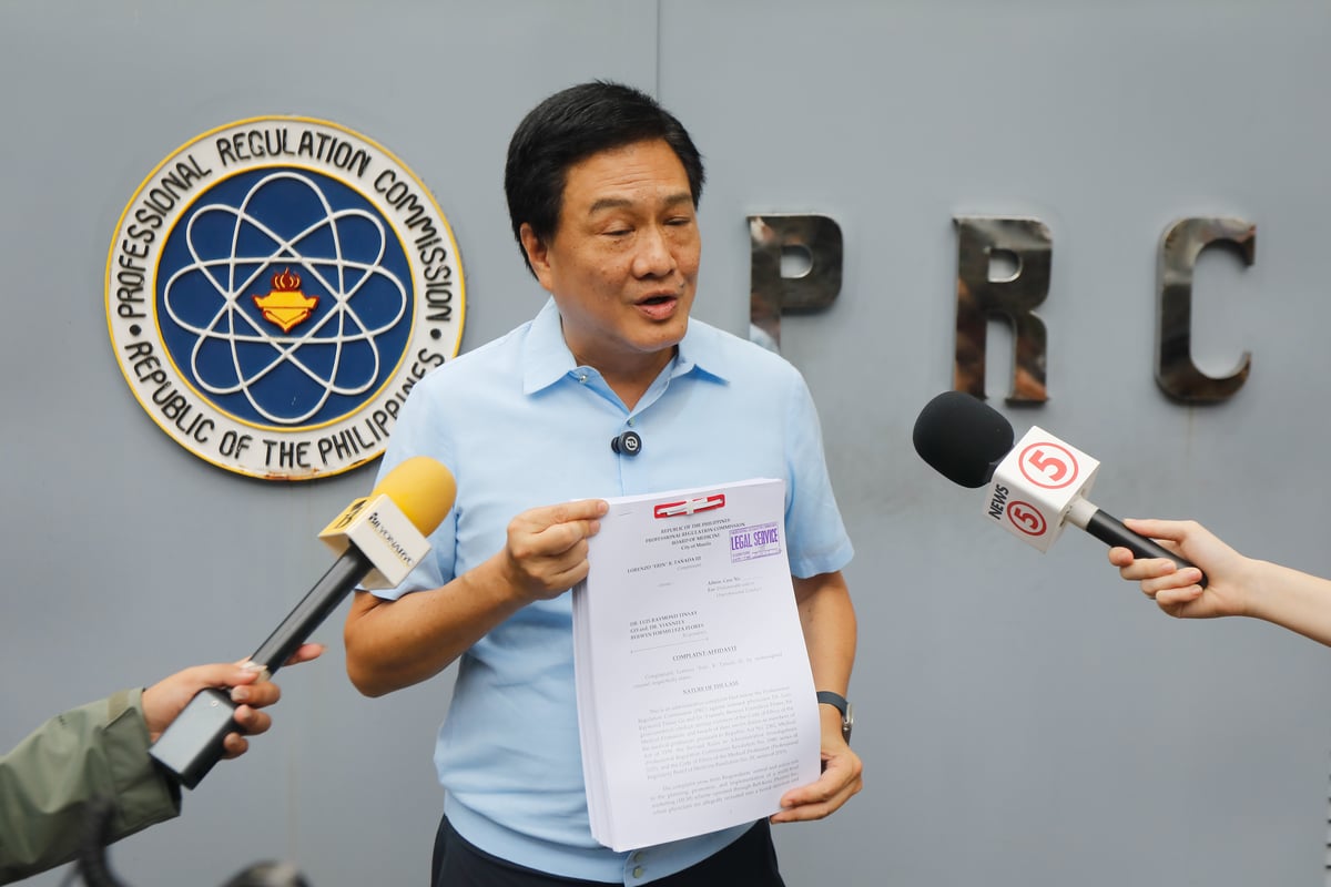 Lawyer and human rights advocate Erin Tañada III files a formal complaint before the Professional Regulation Commission (PRC) in Manila on Thursday, 17 July 2025. Tañada seeks the revocation of medical licenses of doctors allegedly involved in a multi-level marketing scheme, which he claims unethically preyed on sick and poor patients for profit. The complaint stems from revelations made during a Senate investigation into the pharmaceutical company’s practices.