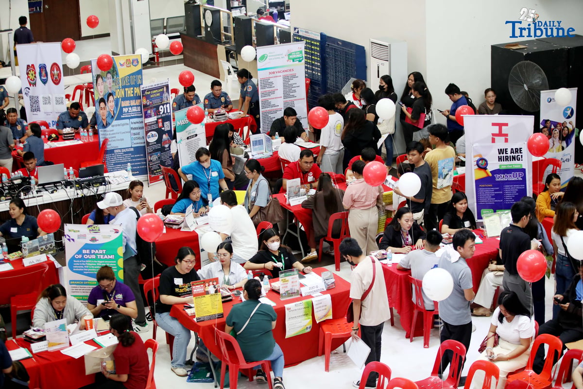 JOB seekers crowd the Mega Job Fair 2025 organized by the San Juan City local government on Thursday. The event aims to connect applicants with employment opportunities.
