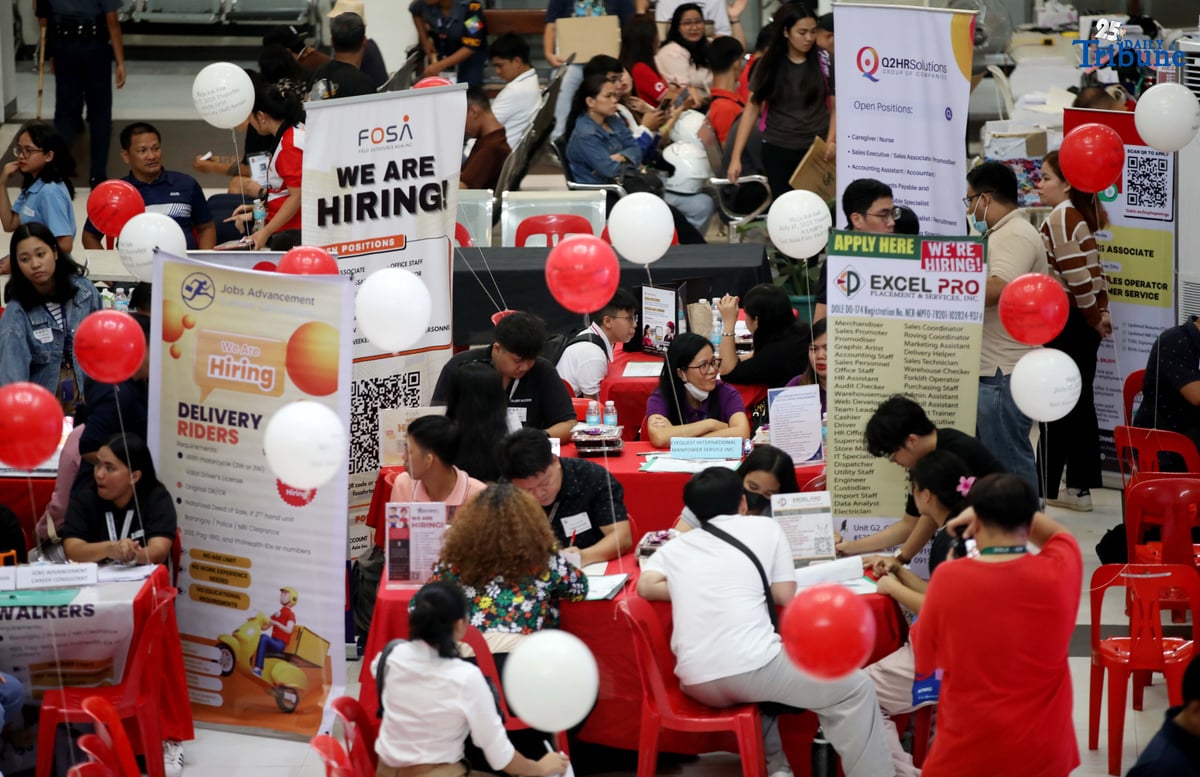 JOB seekers crowd the Mega Job Fair 2025 organized by the San Juan City local government on Thursday. The event aims to connect applicants with employment opportunities.