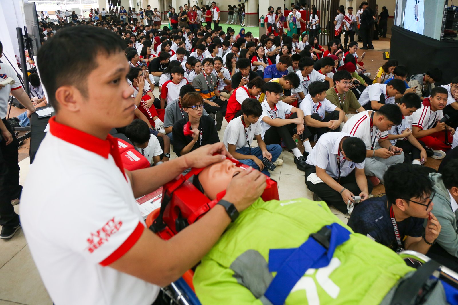 Students from the University East learn how to administer cardiopulmonary resuscitation (CPR) in celebration of National CPR Day (17 July 2025). It also coincides with the anniversary of Republic Act 10871, also known as the Samboy Lim Law, which mandates basic life support training in schools.