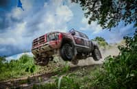 THE Triton gets airborne during a high-speed off-road test.