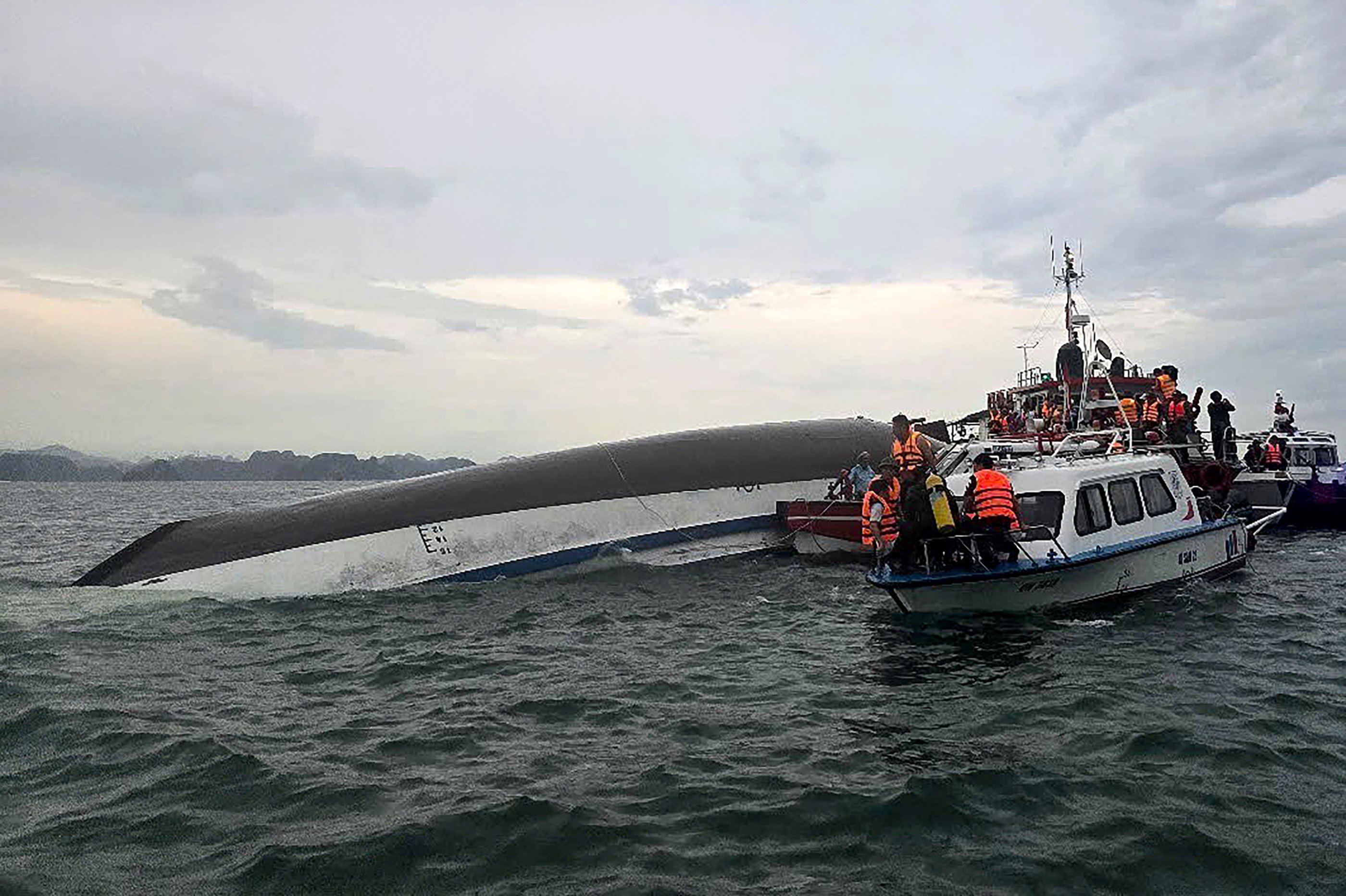 Tourist boat capsizes in Vietnam's Ha Long Bay, leaving 34 dead