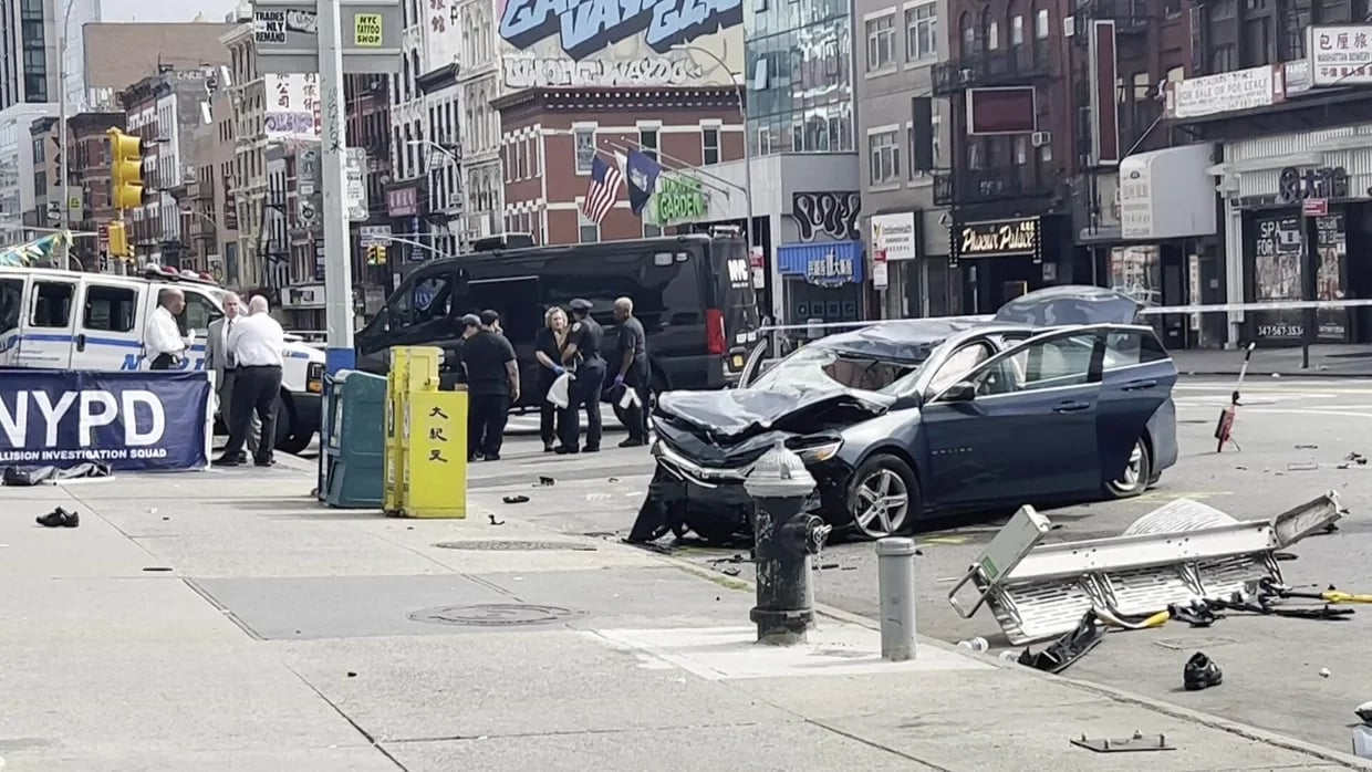 Two dead after speeding car hits cyclist and pedestrian in Manhattan