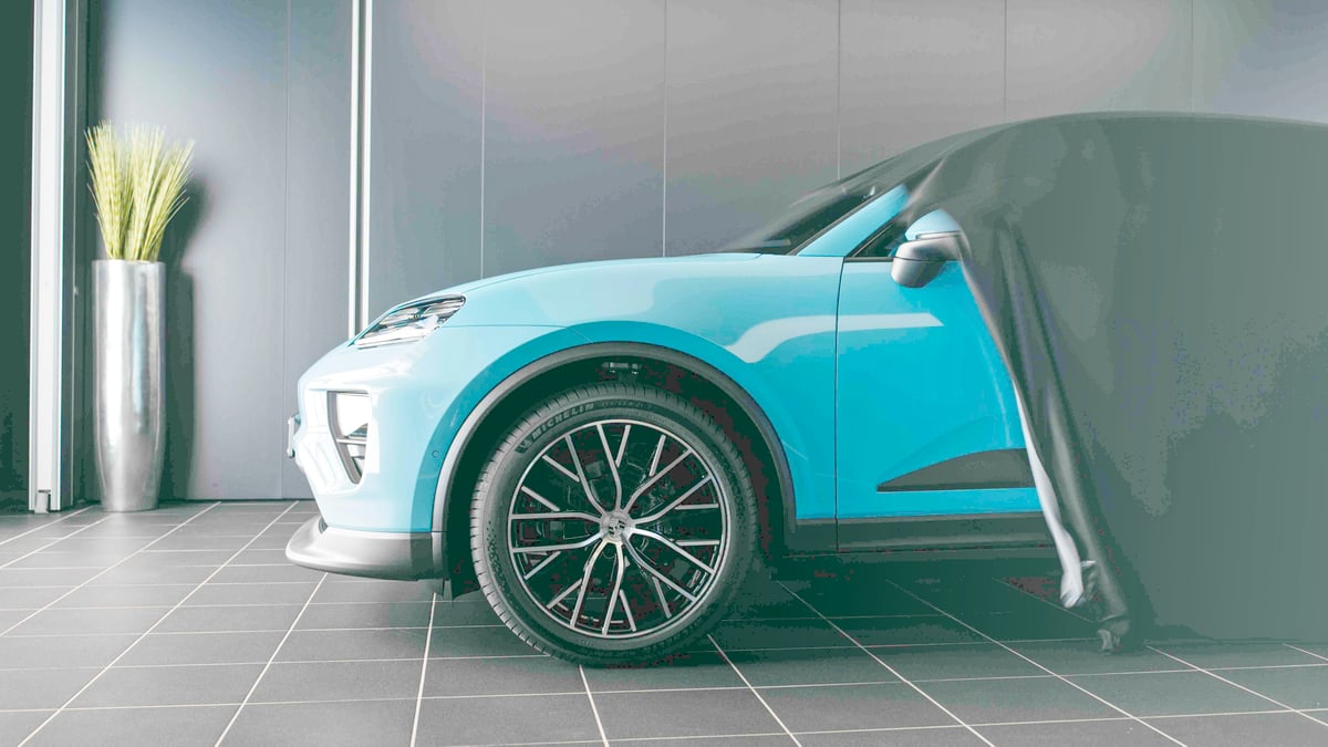 THE milestone Macan 4 in Frozen Blue Metallic is revealed at the Porsche Experience Center in Leipzig.