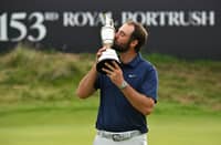 US golfer Scottie Scheffler kisses the Claret Jug, the trophy for the Champion golfer of the year after his victory in the 153rd Open Championship at Royal Portrush golf club in Northern Ireland on July 20, 2025. Scottie Scheffler romped to a magnificent four-shot victory to seal his first British Open title at Royal Portrush on Sunday, notching his fourth major success. The world number one eased to a three-under par final round of 68, finishing on 17-under for the tournament after shooting in the 60s on all four days.