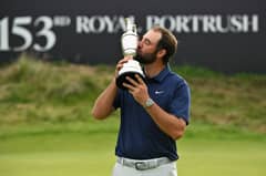 US golfer Scottie Scheffler kisses the Claret Jug, the trophy for the Champion golfer of the year after his victory in the 153rd Open Championship at Royal Portrush golf club in Northern Ireland on July 20, 2025. Scottie Scheffler romped to a magnificent four-shot victory to seal his first British Open title at Royal Portrush on Sunday, notching his fourth major success. The world number one eased to a three-under par final round of 68, finishing on 17-under for the tournament after shooting in the 60s on all four days.