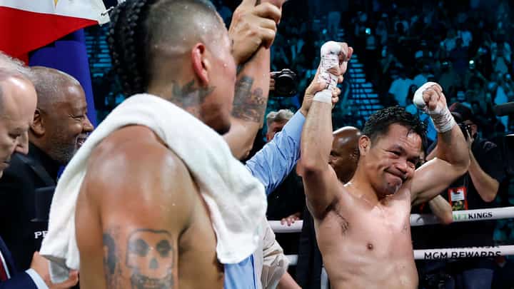 LAS VEGAS, NEVADA - JULY 19: Manny Pacquiao reacts next to Mario Barrios after their WBC welterweight title fight ending in a majority draw at MGM Grand Garden Arena on July 19, 2025 in Las Vegas, Nevada