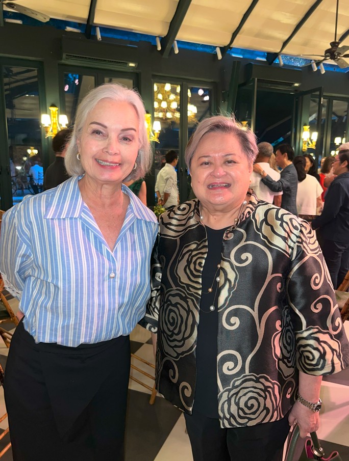 Margie Moran Floirendo with Department of Foreign Affairs Secretary Theresa P. Lazaro.