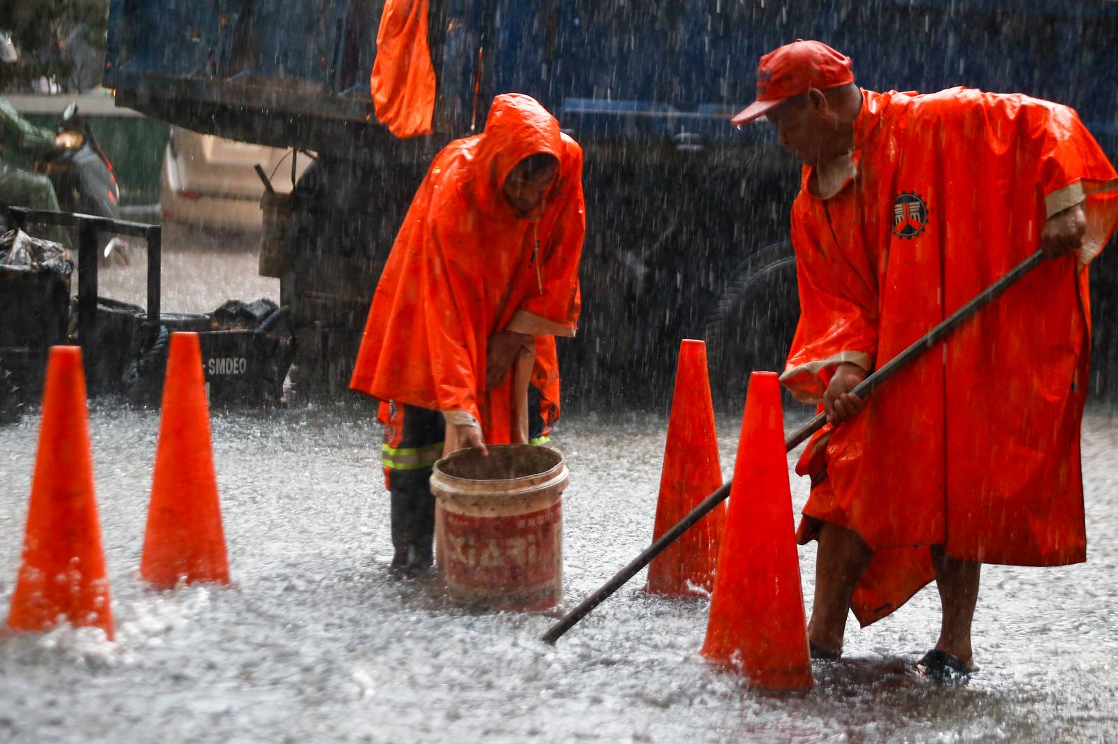 A gutter-deep flood swamps the corner of Taft Avenue and United Nations Avenue in Manila at 9:26 a.m. on Monday, 21 July, as authorities monitor a new low-pressure area within the Philippine Area of Responsibility.