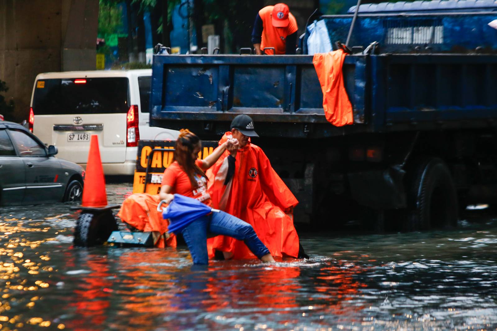 A gutter-deep flood swamps the corner of Taft Avenue and United Nations Avenue in Manila at 9:26 a.m. on Monday, 21 July, as authorities monitor a new low-pressure area within the Philippine Area of Responsibility.