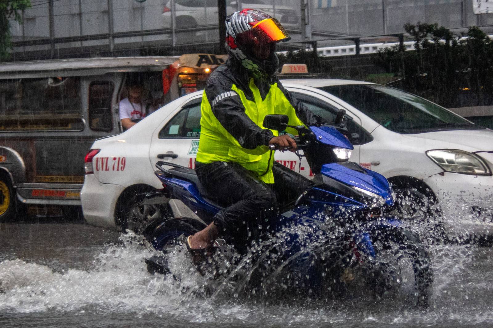 A gutter-deep flood swamps the corner of Taft Avenue and United Nations Avenue in Manila at 9:26 a.m. on Monday, 21 July, as authorities monitor a new low-pressure area within the Philippine Area of Responsibility.