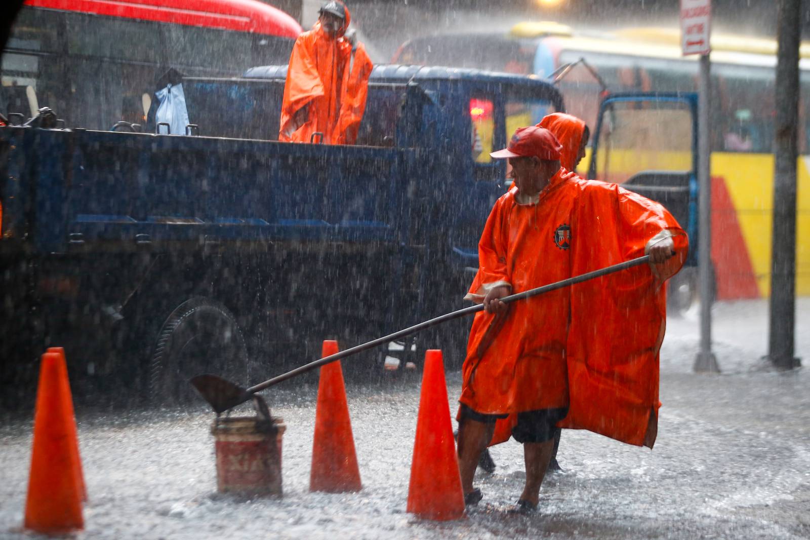 A gutter-deep flood swamps the corner of Taft Avenue and United Nations Avenue in Manila at 9:26 a.m. on Monday, 21 July, as authorities monitor a new low-pressure area within the Philippine Area of Responsibility.