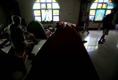 QC residents seek shelter from rising waters