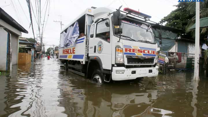 Rescue truck of Obando Bulacan carrying people as they conduct rescue and free ride as well to the stranded people, was seen passing through at the flooded road of Rincon road in Valenzuela City, on Tuesday 22 July 2025.