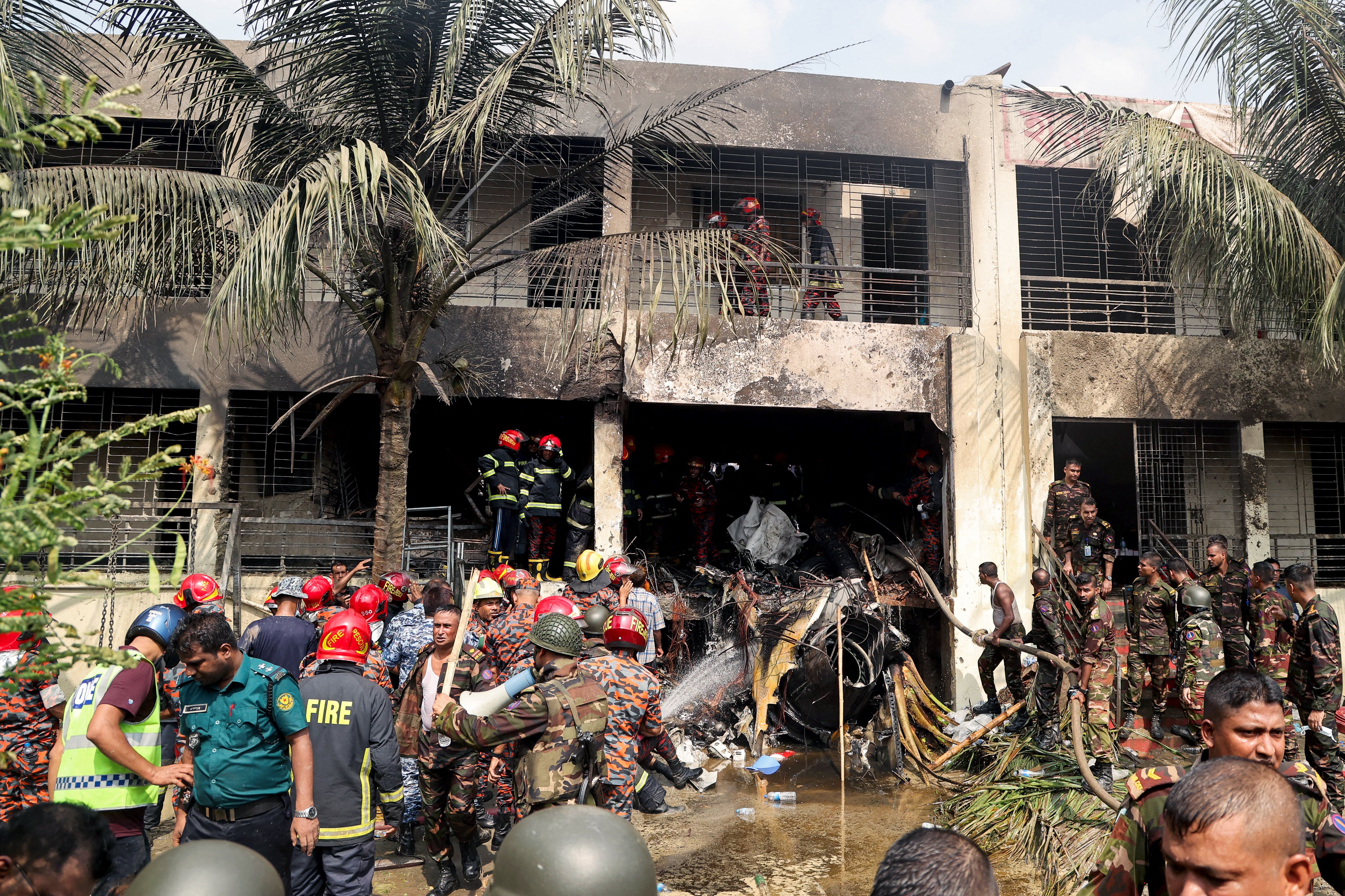 Bangladesh mourns as toll 
from jet crash at school hits 27