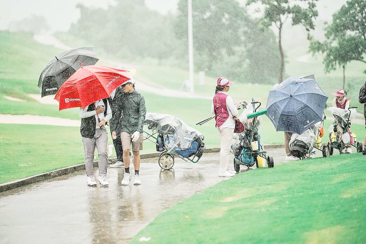 junior golfers and their parents battle wind and rain during the rain-hit opening leg of the Superkit Junior Elite Golf Tour at the Vineyard Golf Club in Tanauan, Batangas on Saturday  —  proving that passion and perseverance know no weather.