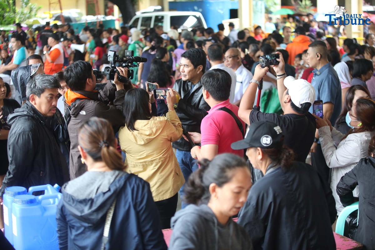 Residents affected by flooding take shelter at Diosdado P. Macapagal Elementary School in Barangay Tatalon, Quezon City. Senator Erwin Tulfo, in partnership with World Vision, led a relief and feeding program for evacuees on Wednesday, July 23, 2025.