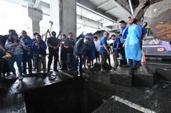 MMDA clears trash from Tripa de Gallina