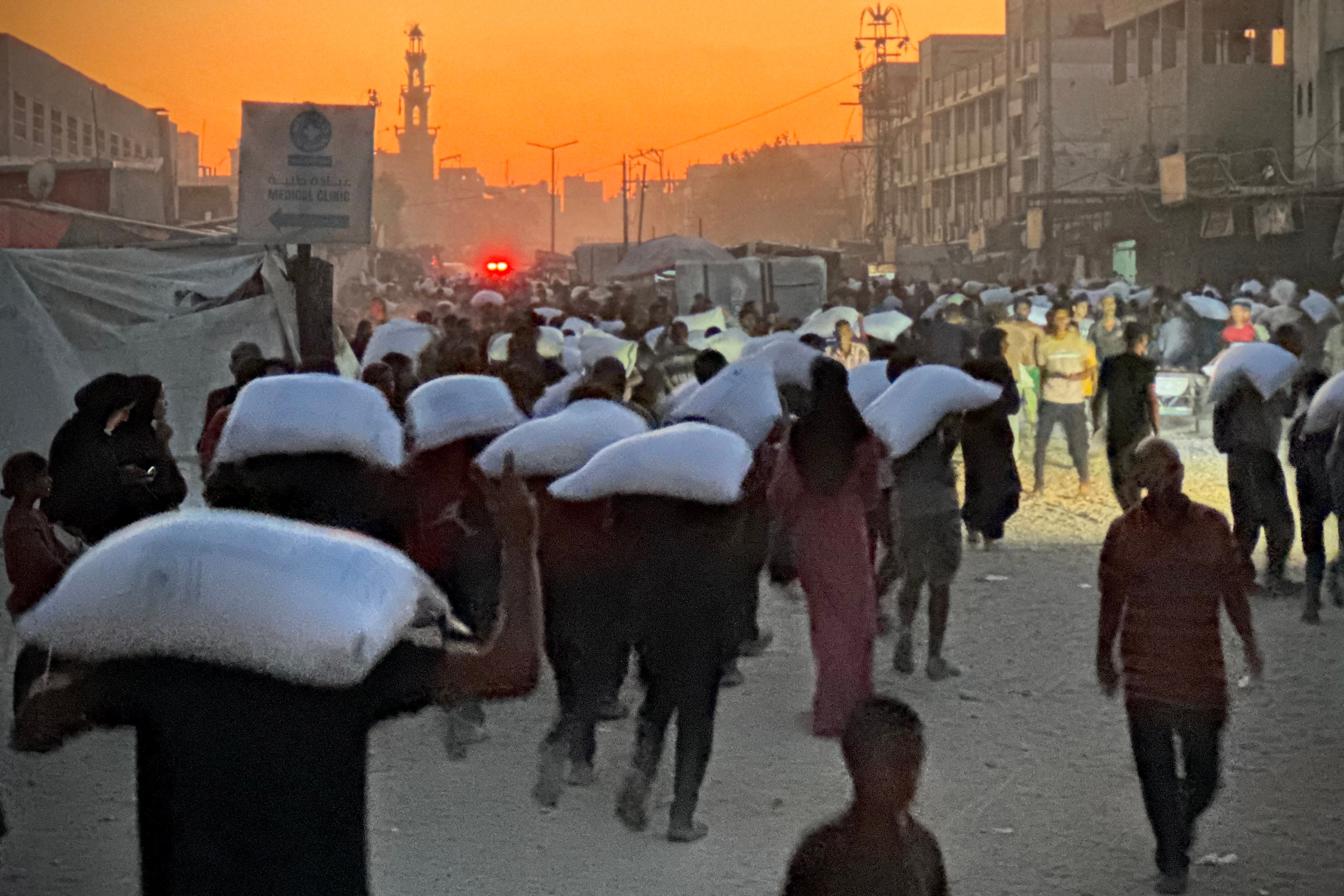 Hungry, exhausted journalists struggle to cover Gaza war