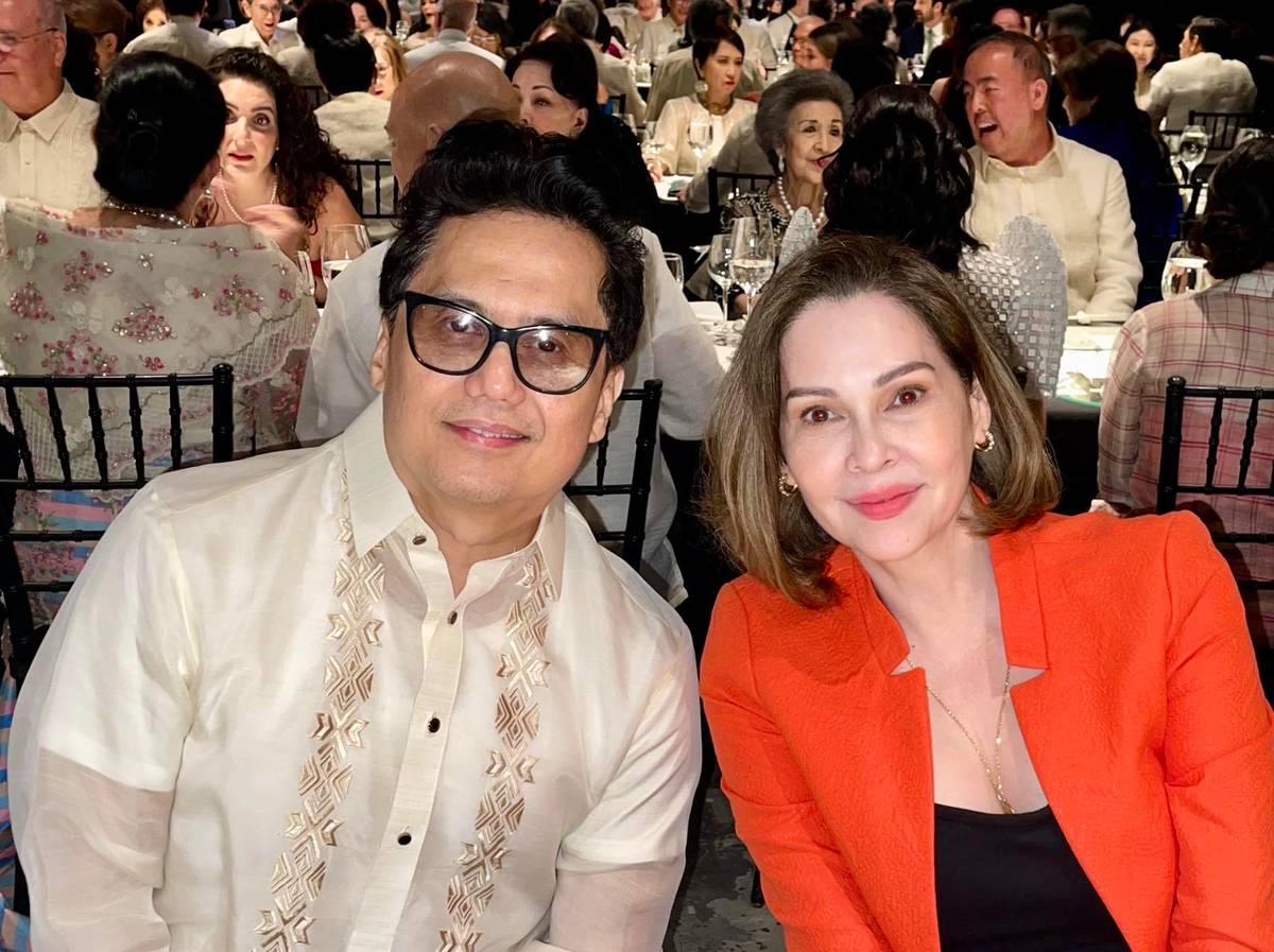 Derek Flores and artist Sandra Fabie-Gfeller.