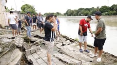DPWH inspects flood-hit slope protection along Camiling River
