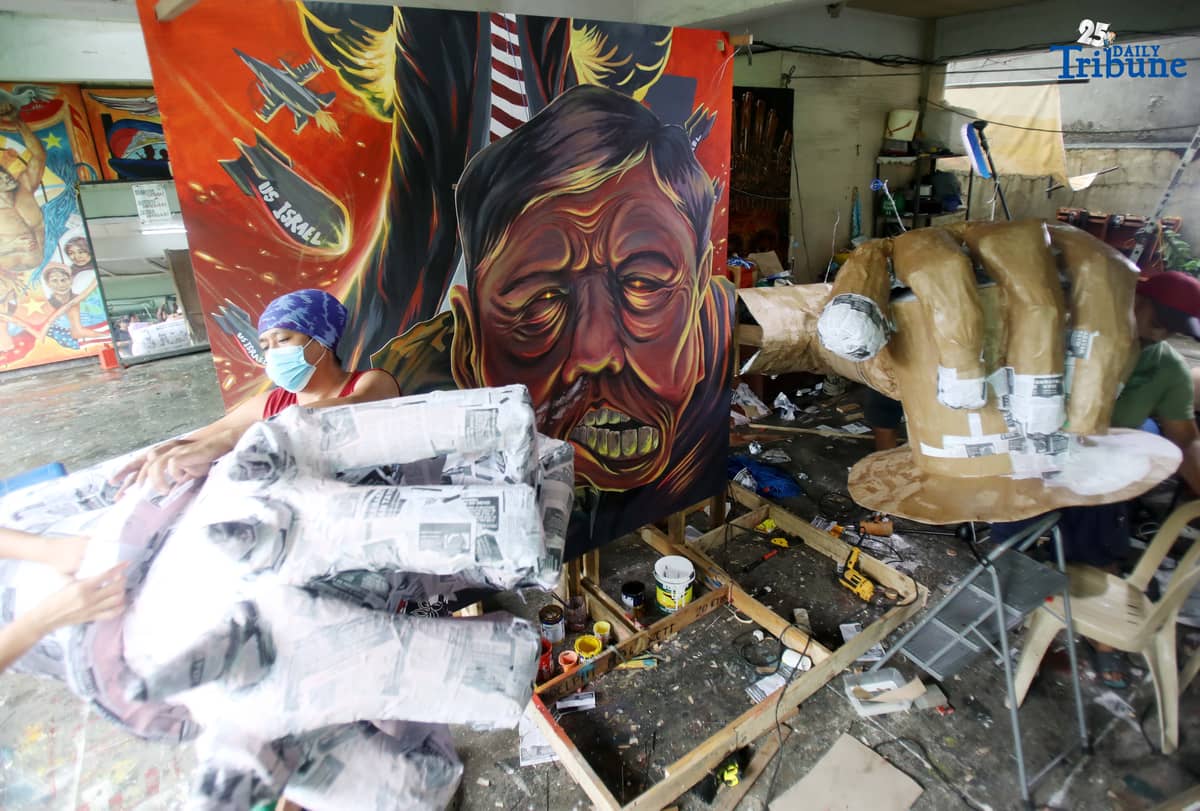 (July, 25 2025) Member of Bayan put finishing touches on their effigy symbolizing the puppetry, fascism, and deception of President Ferdinand Marcos Jr, at their office in Quezon City on Friday, July 25, 2025, in preparation for the coming 4th SONA of President Ferdinand Marcos Jr. Photo/Analy Labor