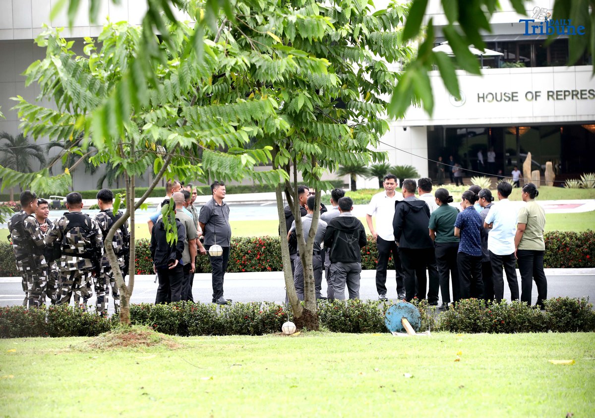 Members of the Malacañang Presidential Security Group (PSG) conduct a walkthrough outside the House of Representatives in Quezon City on Saturday, July 26, 2025, as part of the security preparations for President Ferdinand Marcos Jr.'s 4th State of the Nation Address.