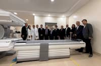 CGHMC doctors and PCCAI board members gather at the hospital’s new NM/CT 860 SPECT/CT machine, one of only two in the country.