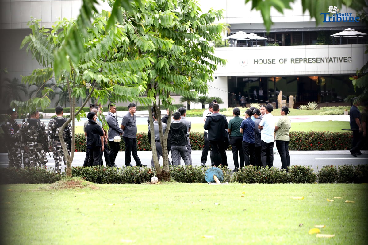 Members of the Malacañang Presidential Security Group (PSG) conduct a walkthrough outside the House of Representatives in Quezon City on Saturday, July 26, 2025, as part of the security preparations for President Ferdinand Marcos Jr.'s 4th State of the Nation Address.
