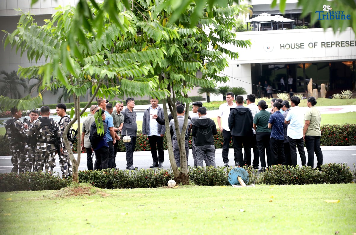 Members of the Malacañang Presidential Security Group (PSG) conduct a walkthrough outside the House of Representatives in Quezon City on Saturday, July 26, 2025, as part of the security preparations for President Ferdinand Marcos Jr.'s 4th State of the Nation Address.
