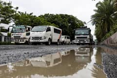 Damaged roads cause sluggish traffic along Roxas Blvd in Pasay City on Saturday, 26 July 2025, following heavy rains brought by the habagat and the back-to-back-to-back typhoons.